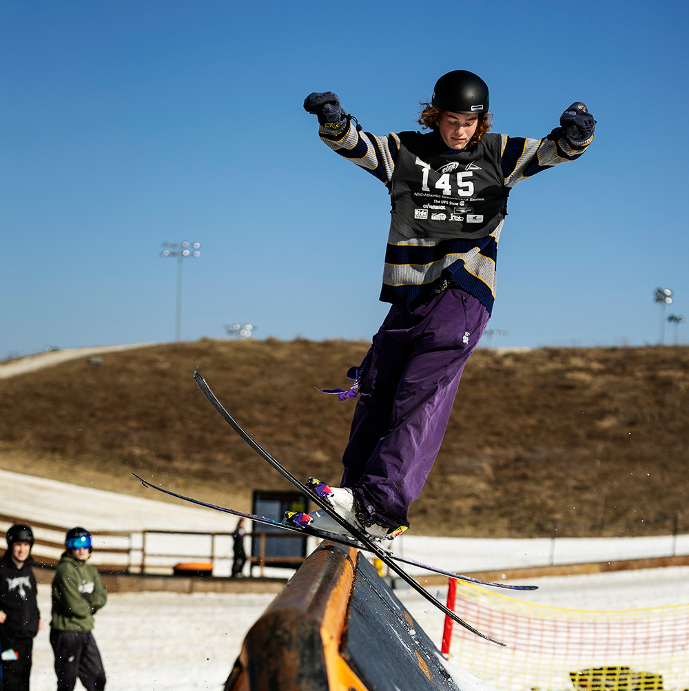 Skier competing in terrain competition