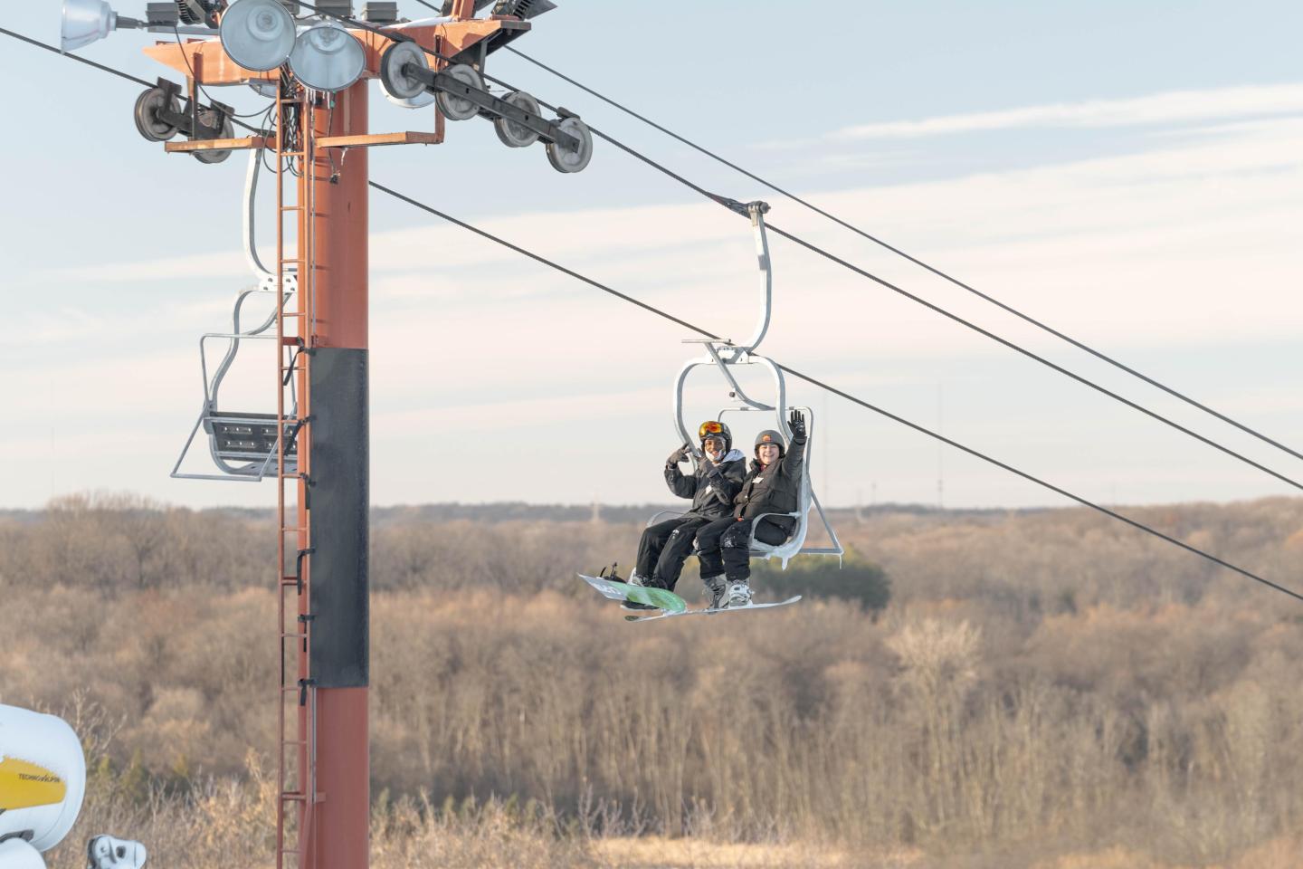 two people on chair lift