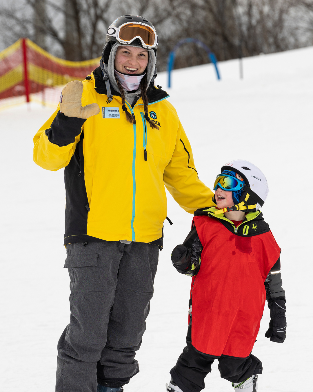 instructor and child posing