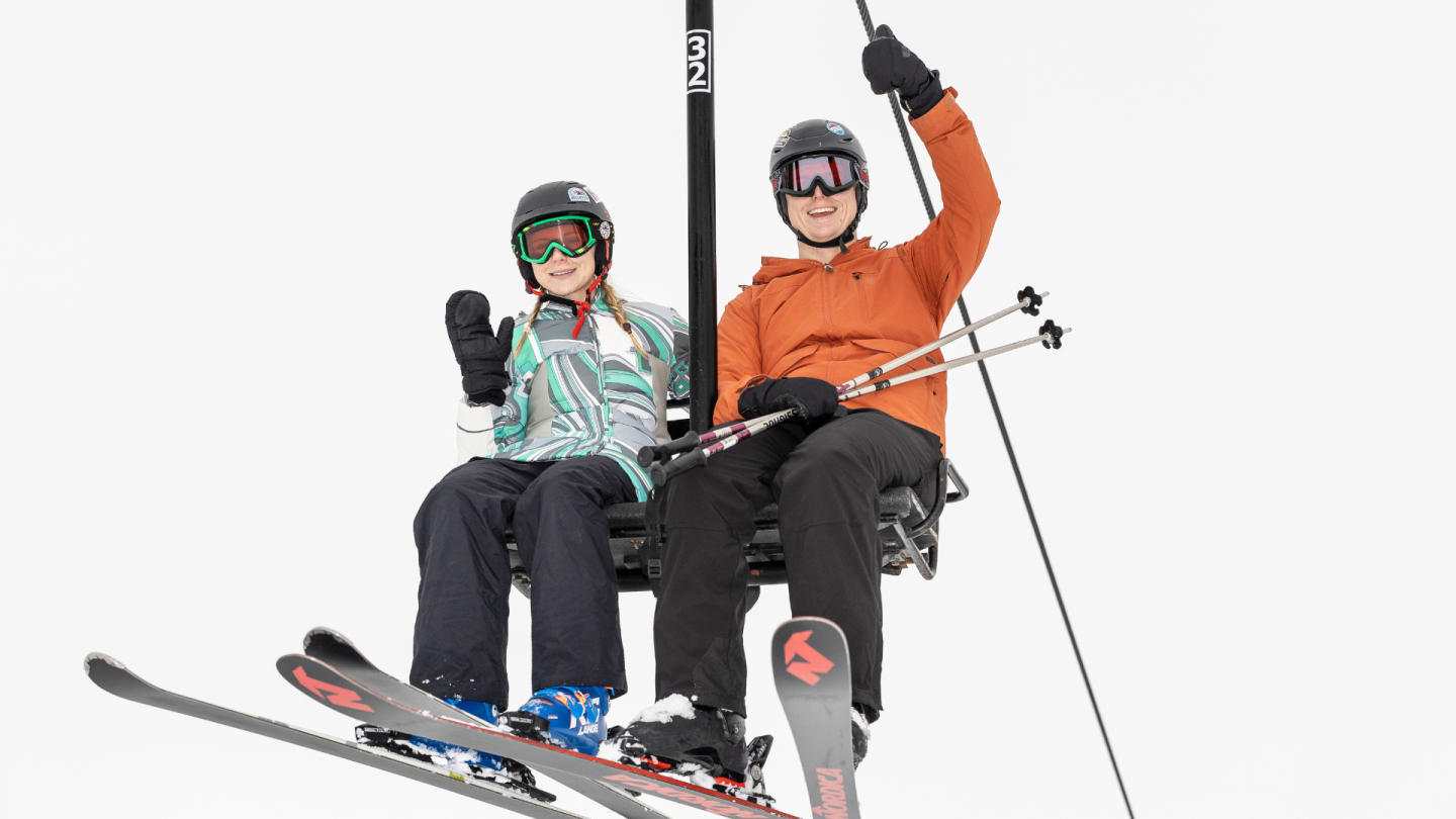two people on chair lift