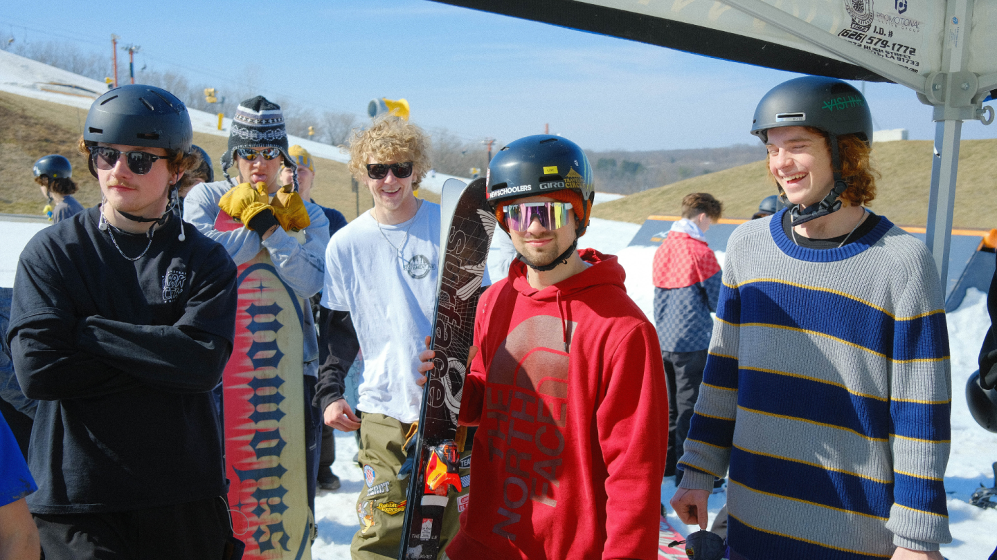group of skiers and snowboarders