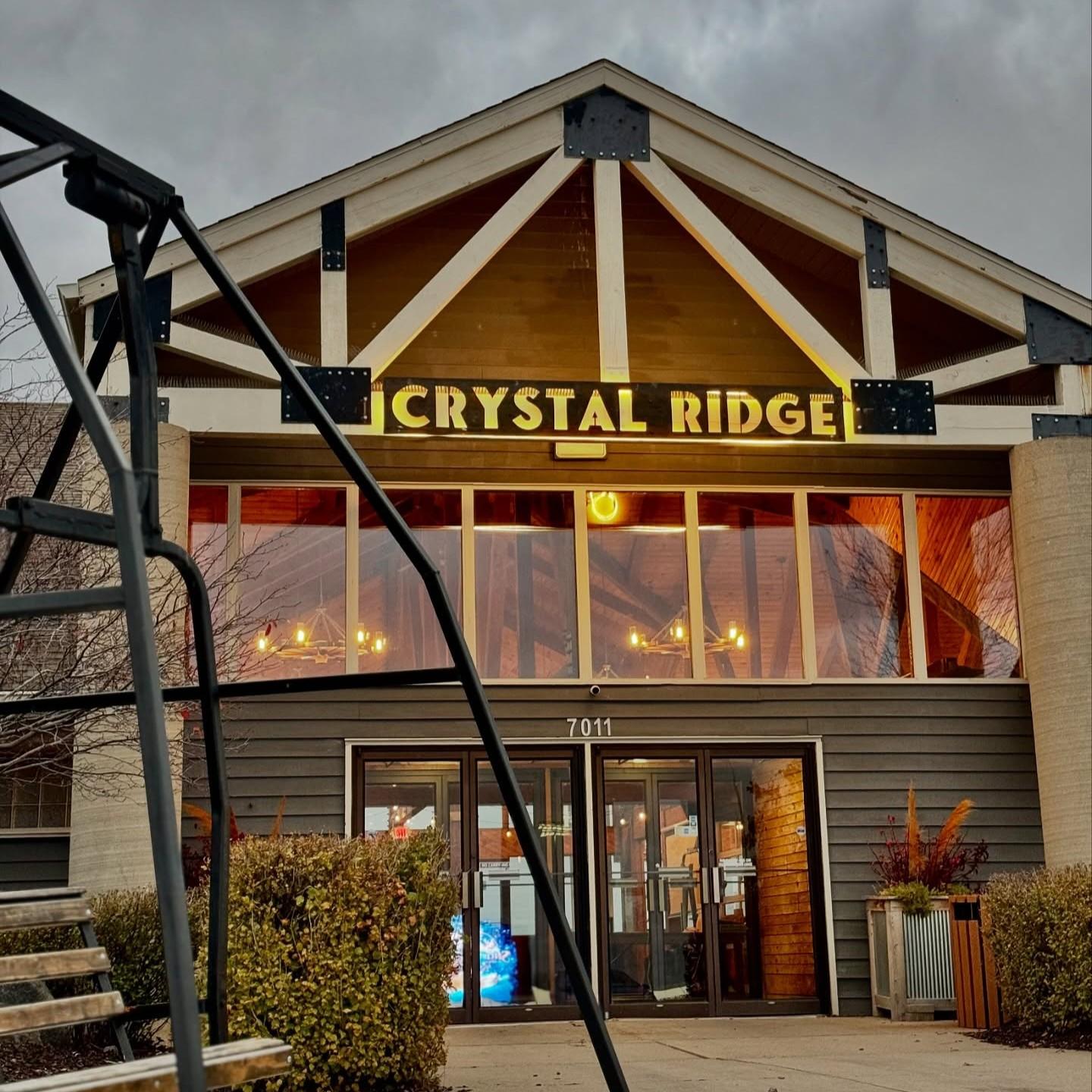 Crystal Ridge ski lodge entrance on a cloudy day.