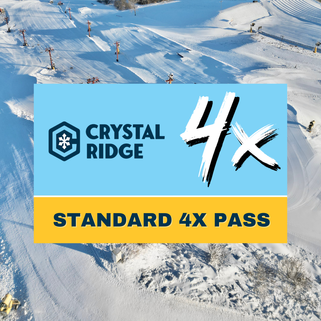 Ski resort with snowy slopes and chairlifts under a clear sky.